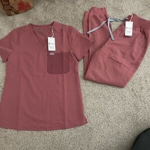 Figs mauve NWT scrubs XS top and XS bottoms